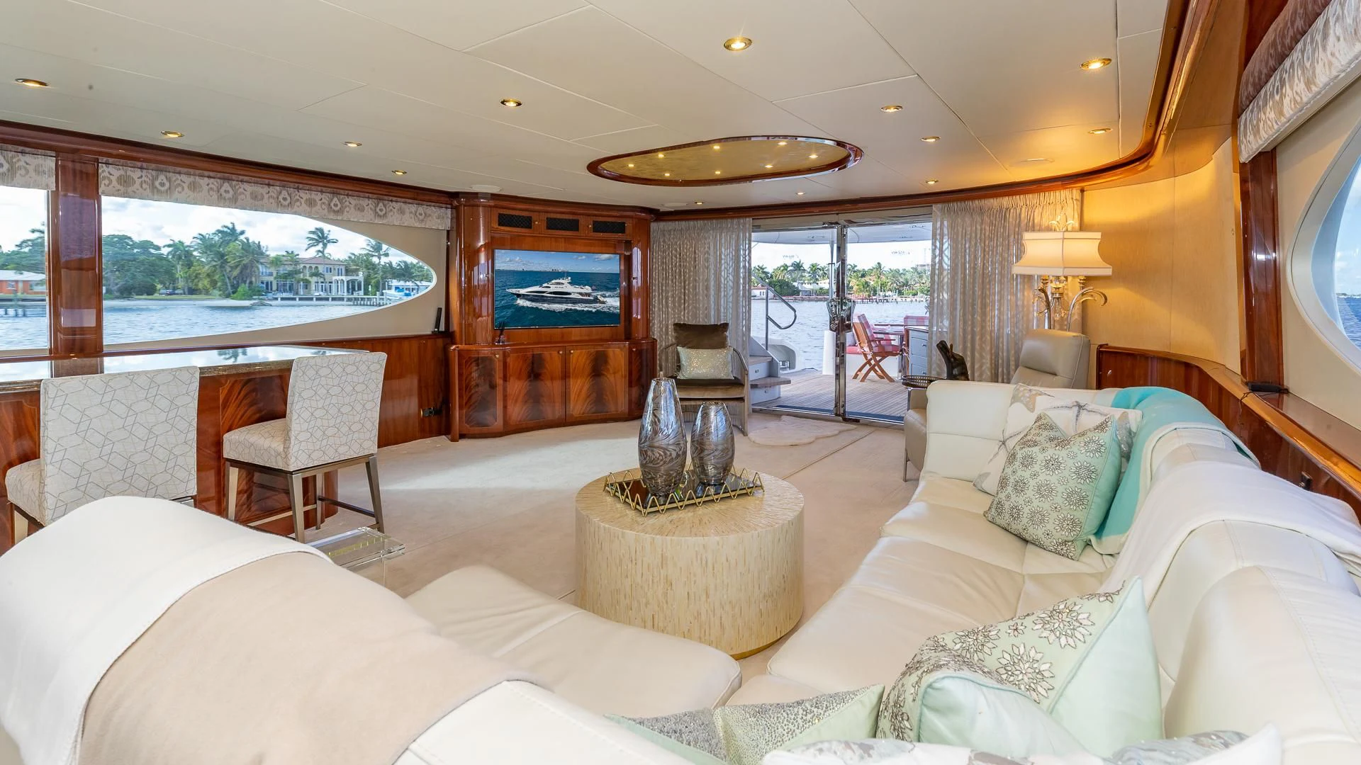 a living room with a large window aboard HOPE FLOATS Yacht for Sale