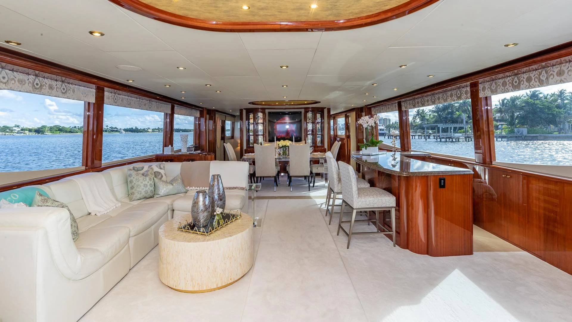 a living room with a large window aboard HOPE FLOATS Yacht for Sale