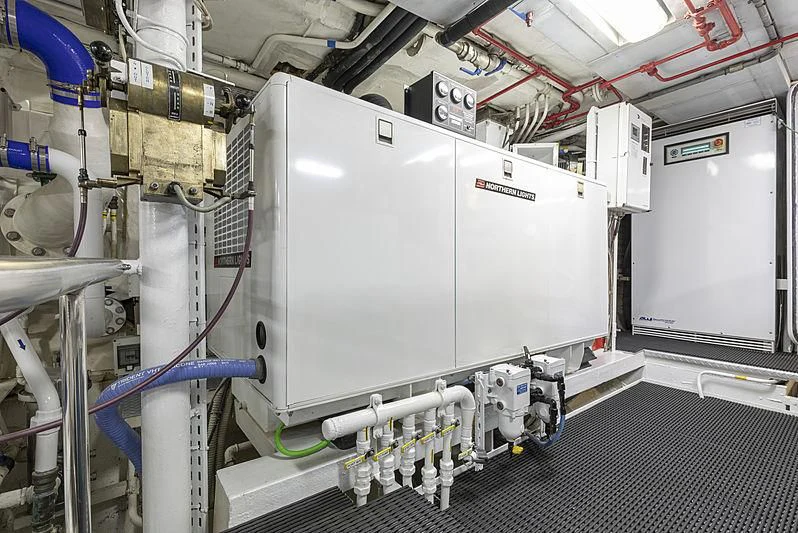 a large white machine aboard MONTREVEL Yacht for Sale