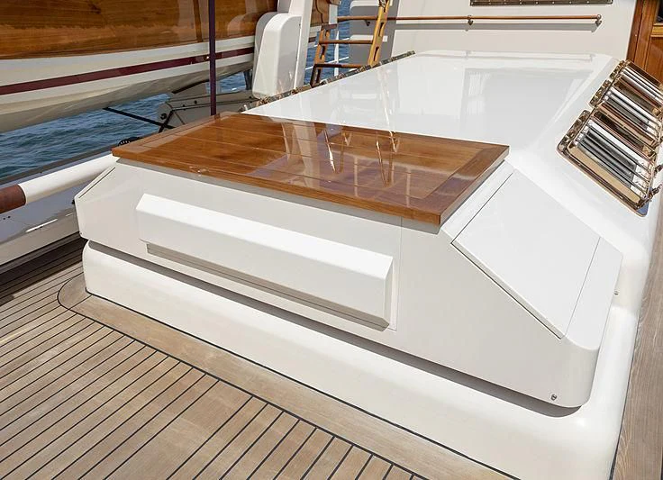a white rectangular object on a wooden surface aboard MONTREVEL Yacht for Sale