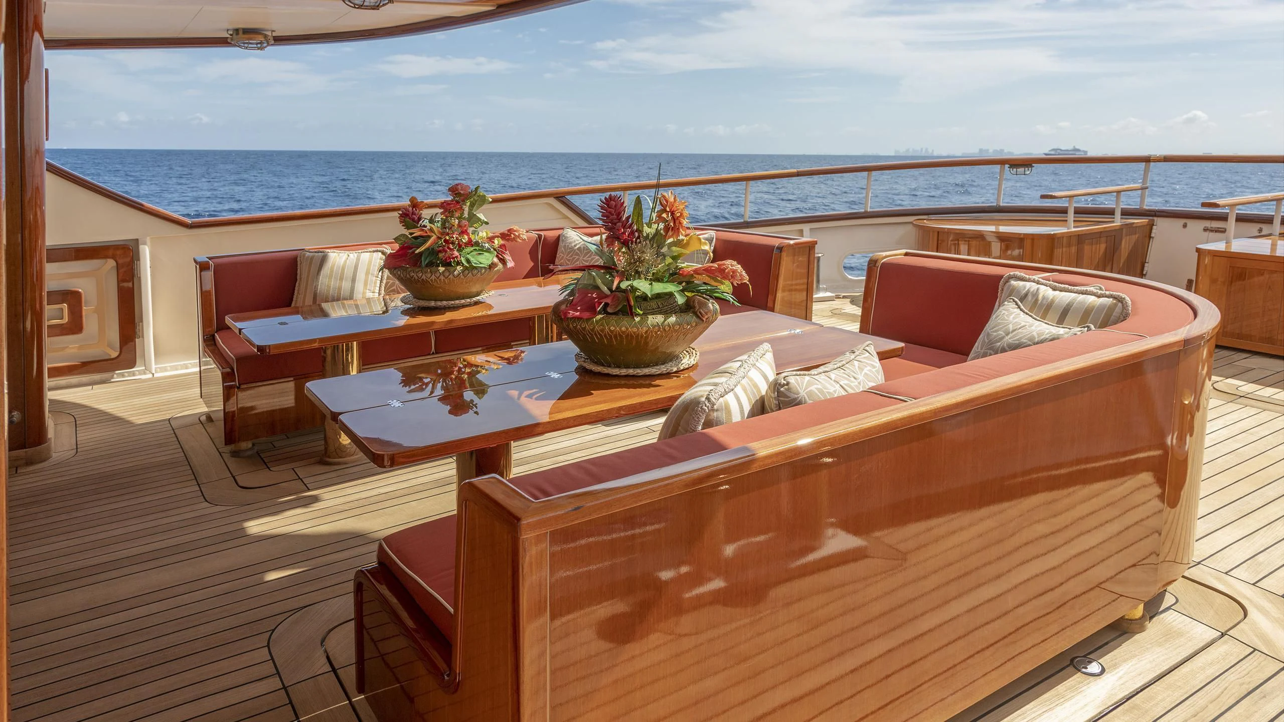 a room with a table and chairs aboard MONTREVEL Yacht for Sale