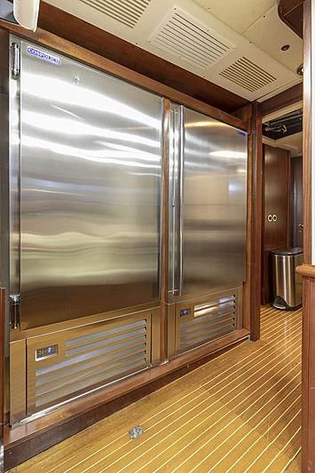 a large silver refrigerator aboard MONTREVEL Yacht for Sale