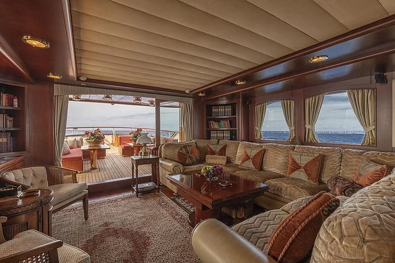 a living room with a large window aboard MONTREVEL Yacht for Sale