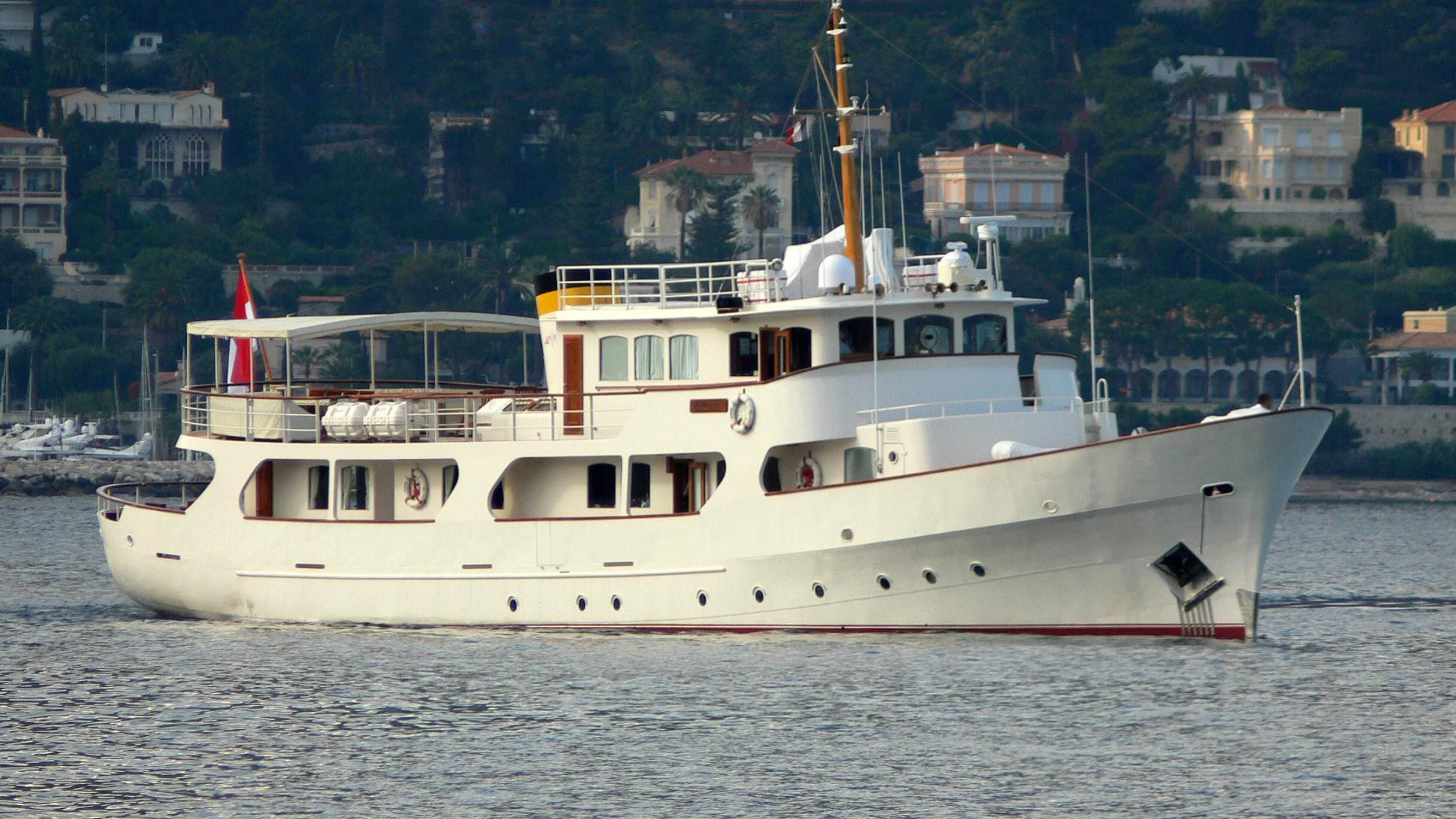 a large white boat aboard MONTREVEL Yacht for Sale
