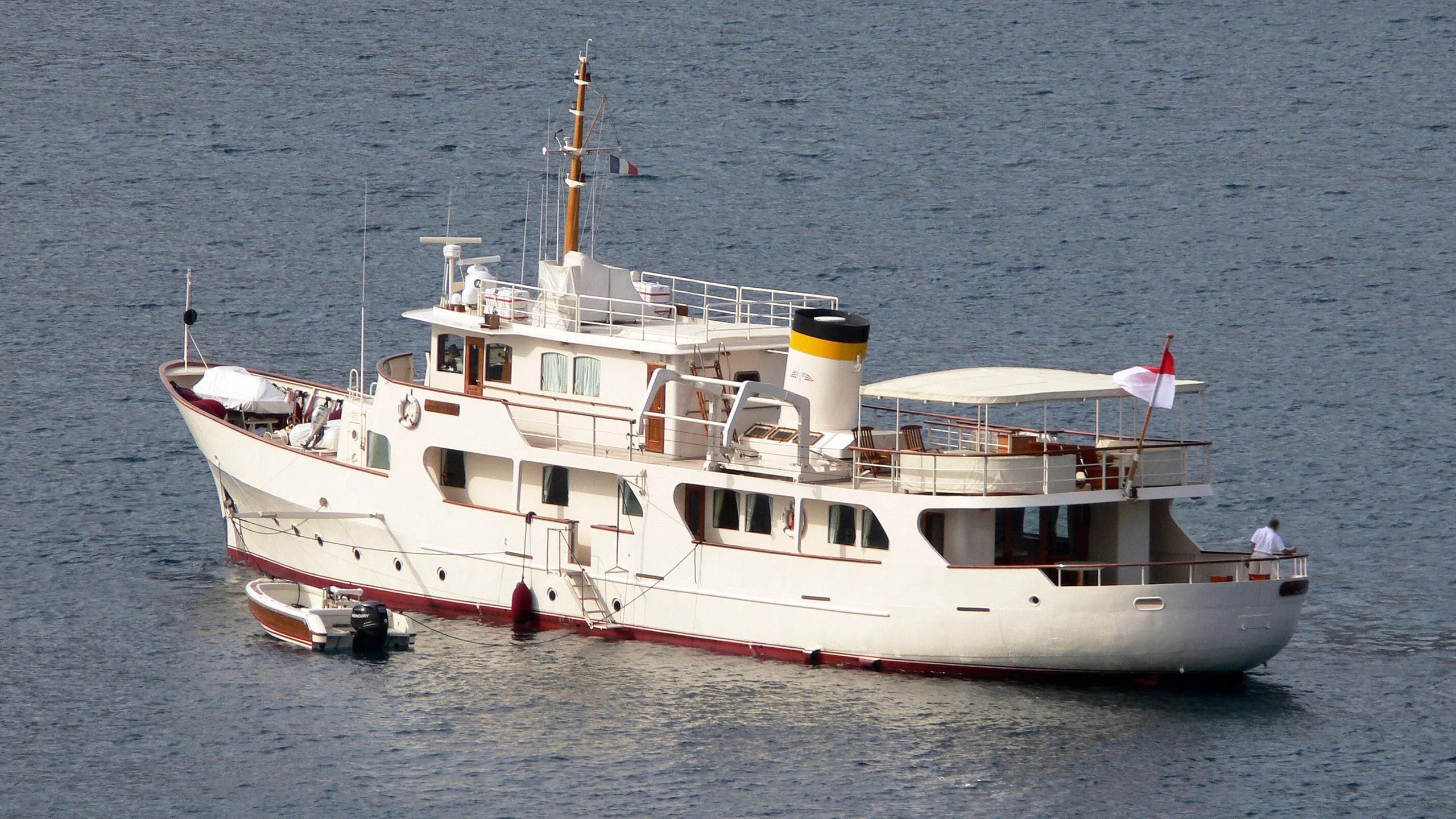 a large white boat in the water aboard MONTREVEL Yacht for Sale
