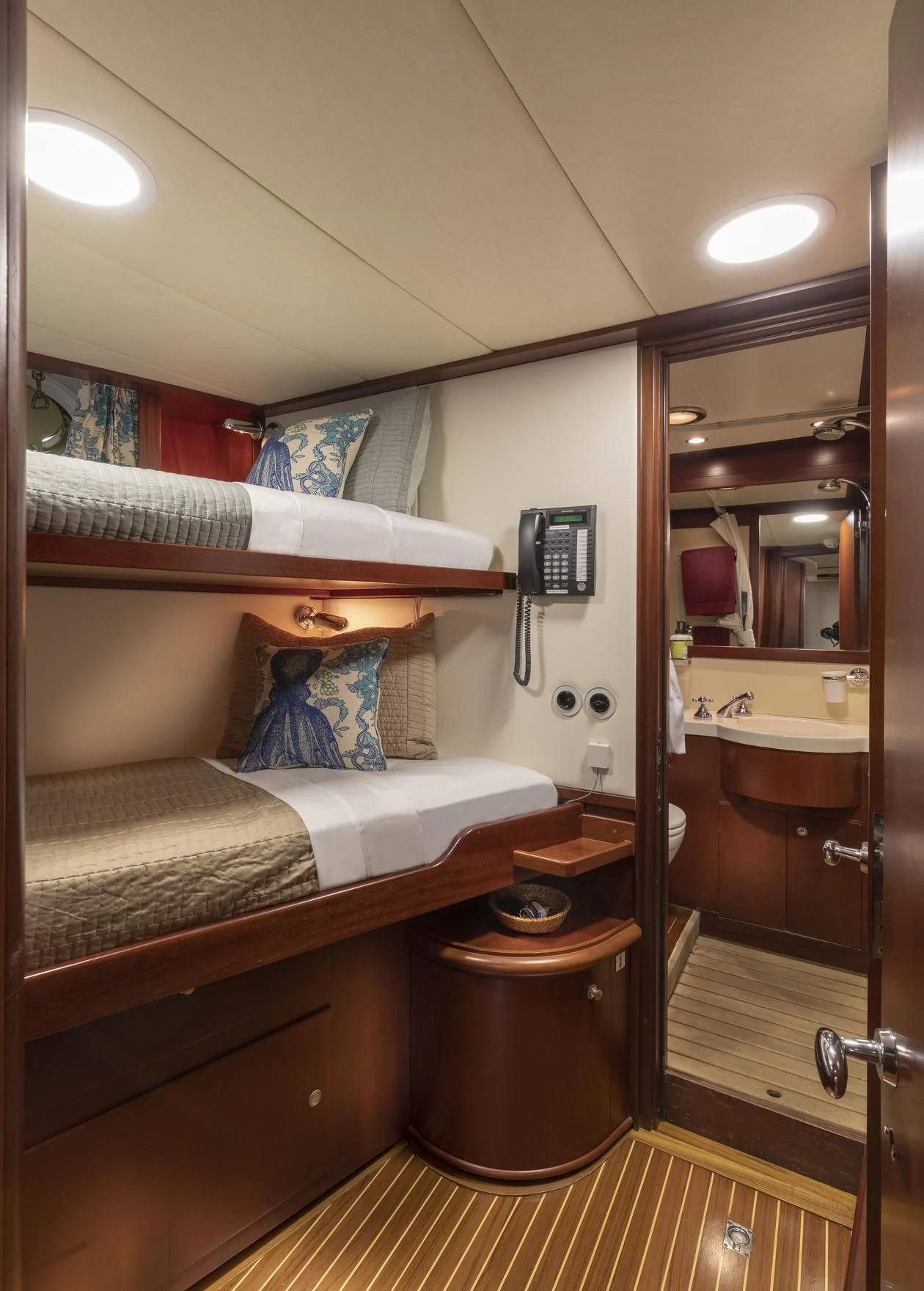 a bathroom with a sink and a mirror aboard MONTREVEL Yacht for Sale