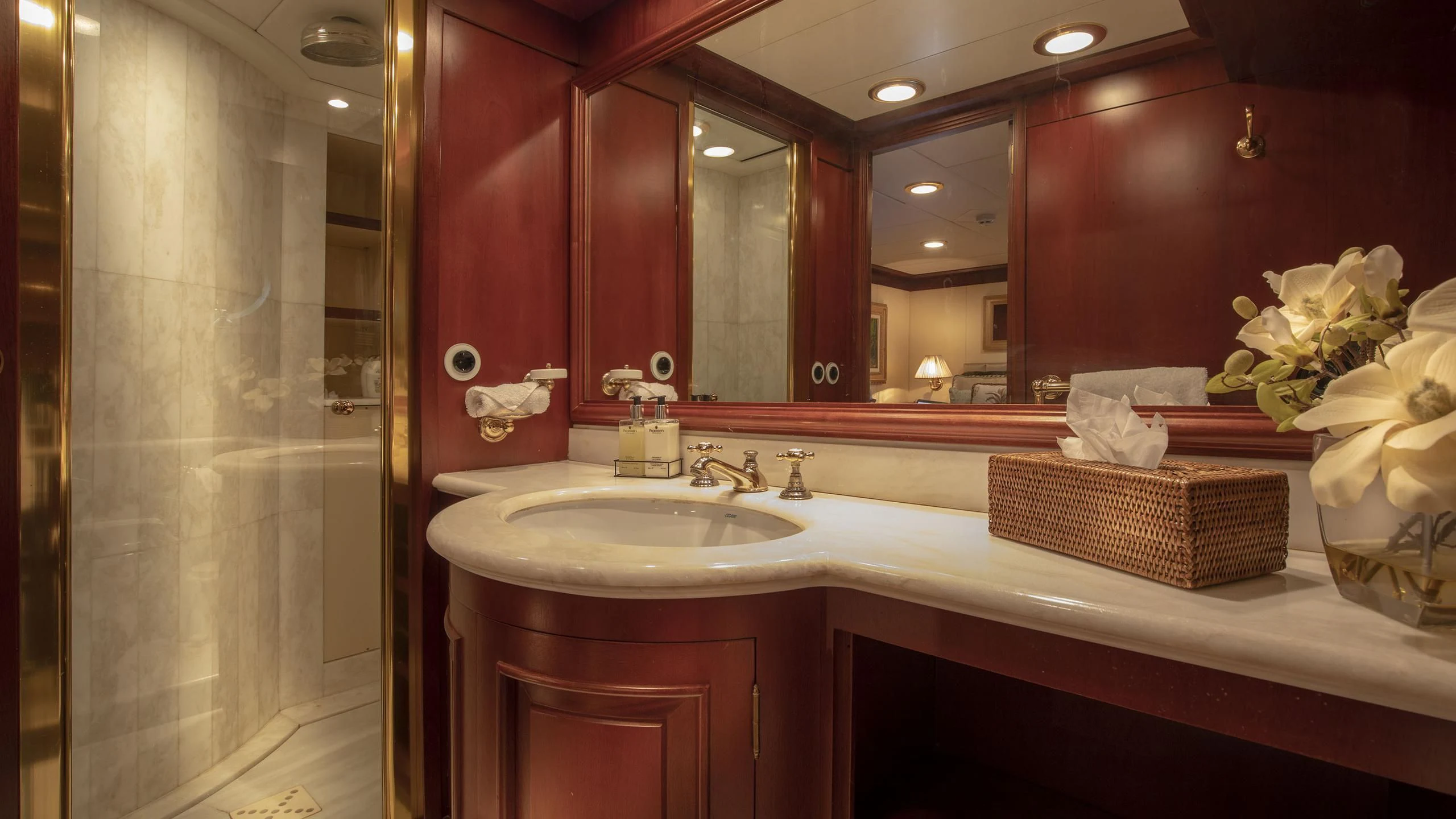 a bathroom with a large mirror aboard MONTREVEL Yacht for Sale