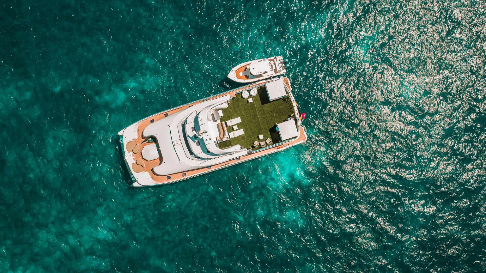 a small boat on the water aboard SAMARA Yacht for Charter
