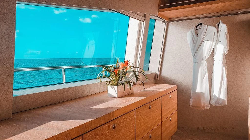a room with a window and a sink aboard SAMARA Yacht for Charter