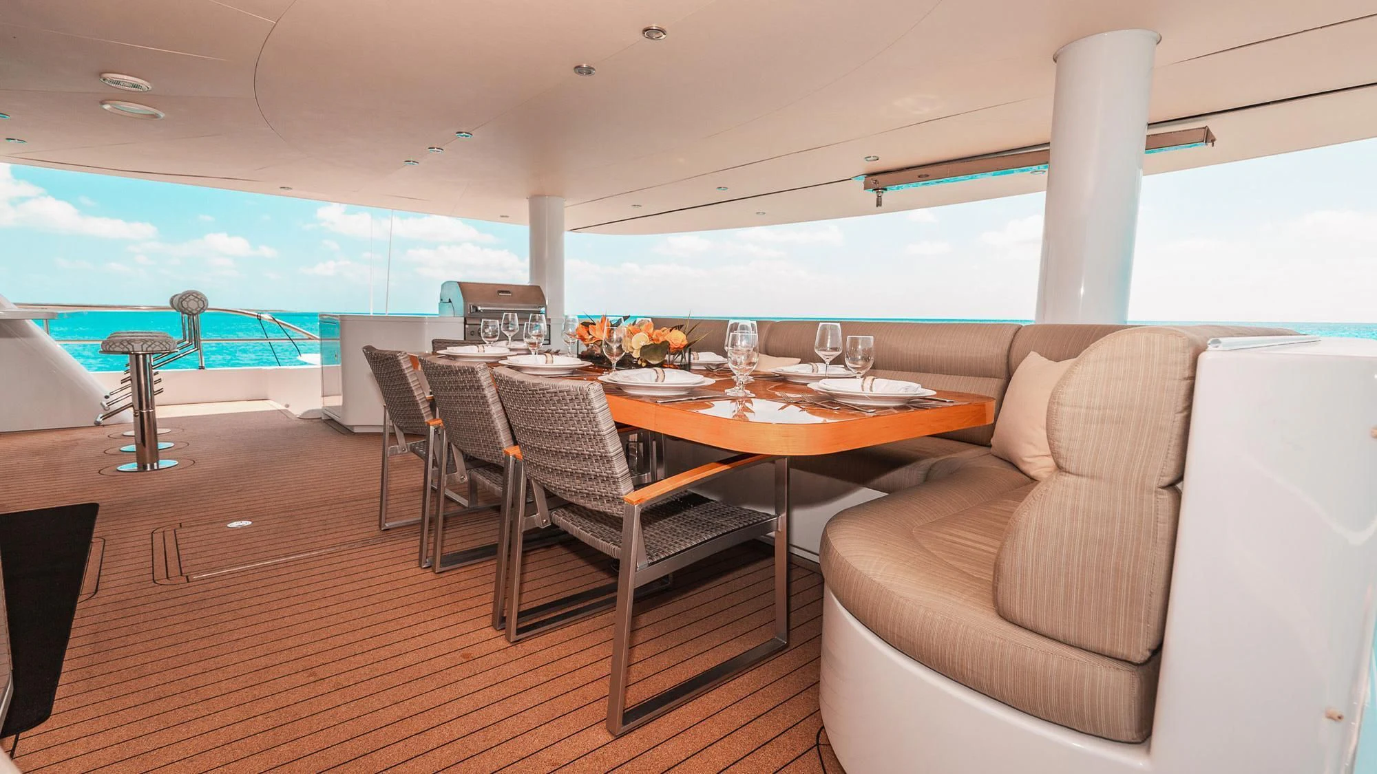 a room with a table and chairs aboard SAMARA Yacht for Charter