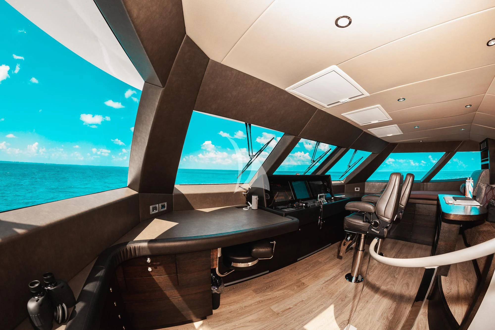 a room with a large screen aboard SAMARA Yacht for Charter