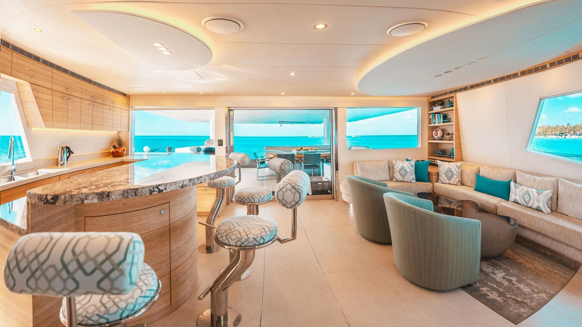 a living room with a large window aboard SAMARA Yacht for Charter