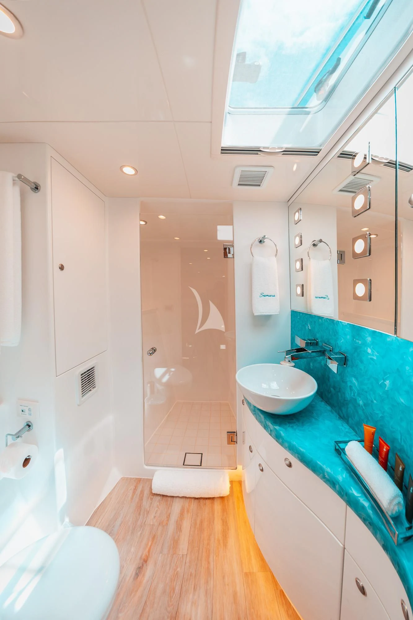 a bathroom with a sink and a shower aboard SAMARA Yacht for Charter