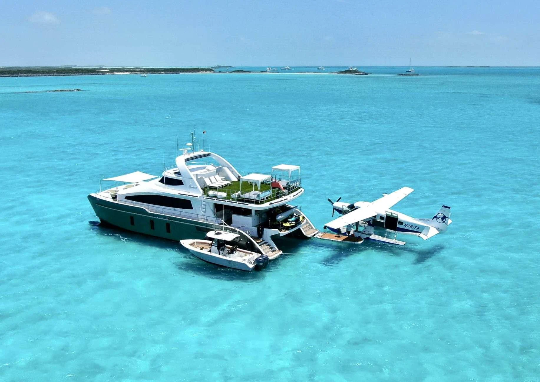 a boat and a plane in the water aboard SAMARA Yacht for Charter
