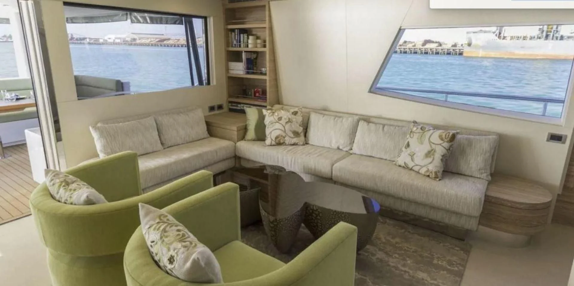 a living room with a large window aboard SAMARA Yacht for Charter