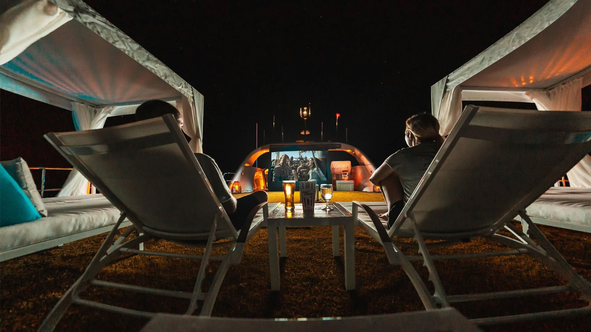 a person sitting at a table aboard SAMARA Yacht for Charter