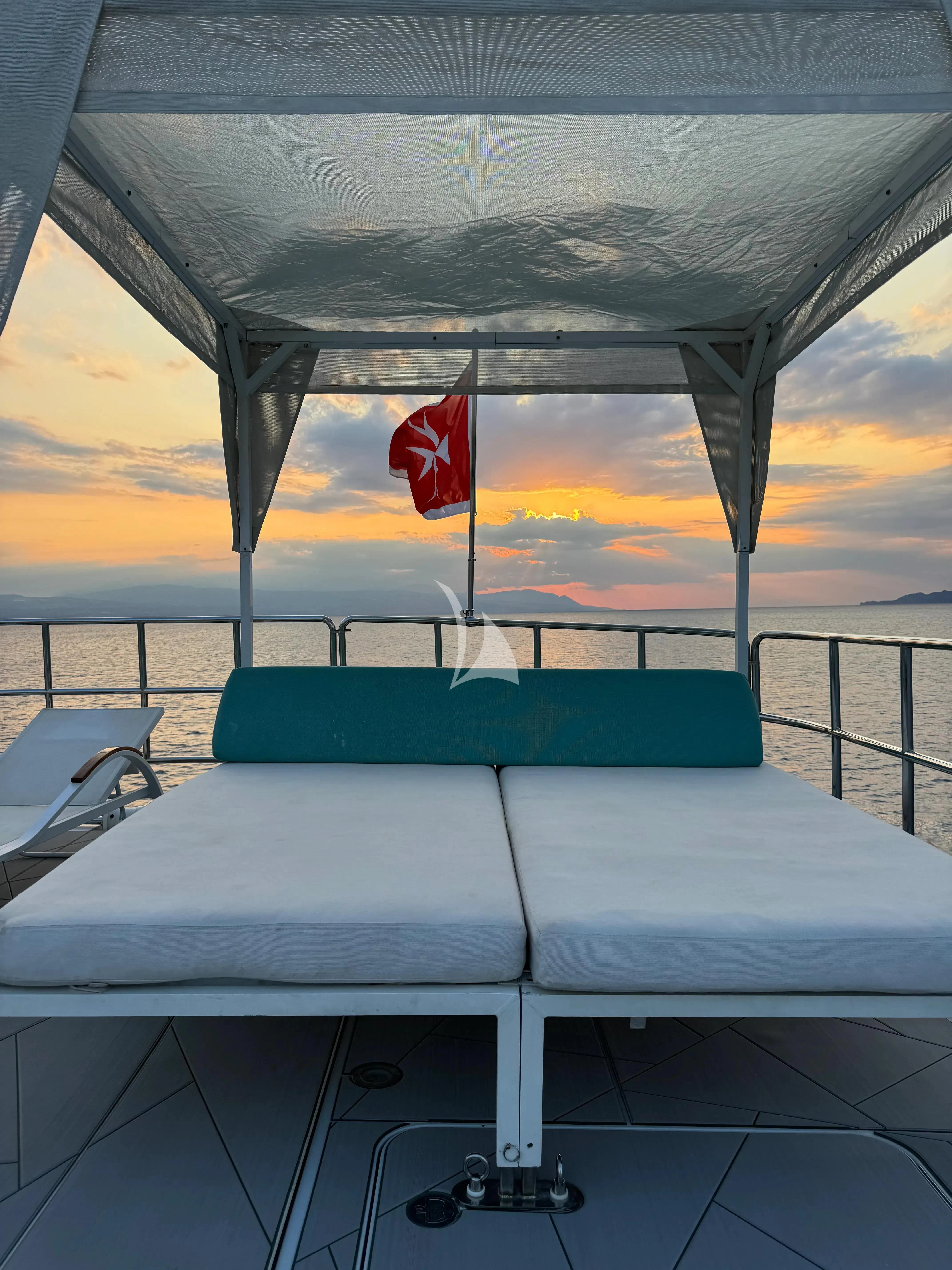 a pool table with a flag on it aboard SAMARA Yacht for Charter