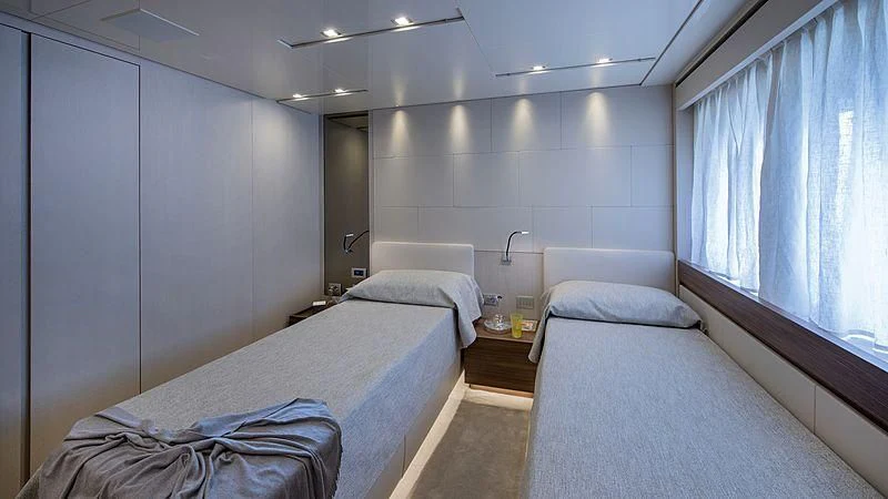 a room with two beds aboard OCTAVE Yacht for Sale