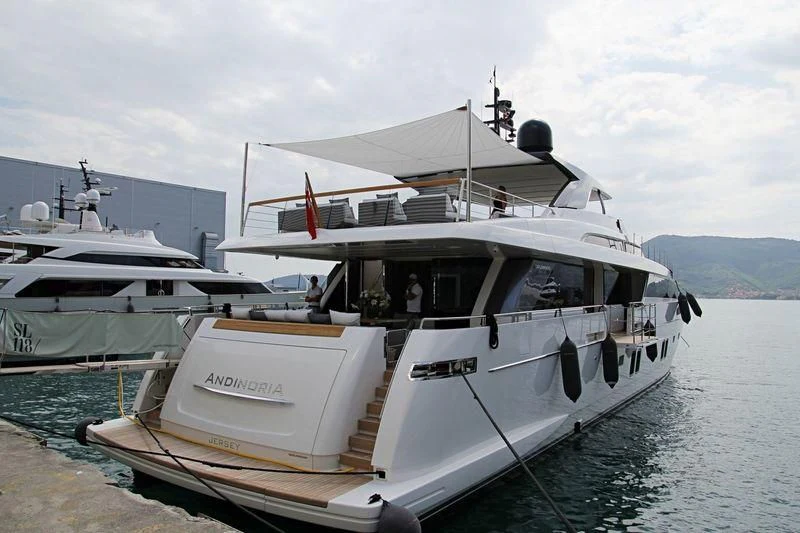 a boat docked at a pier aboard OCTAVE Yacht for Sale