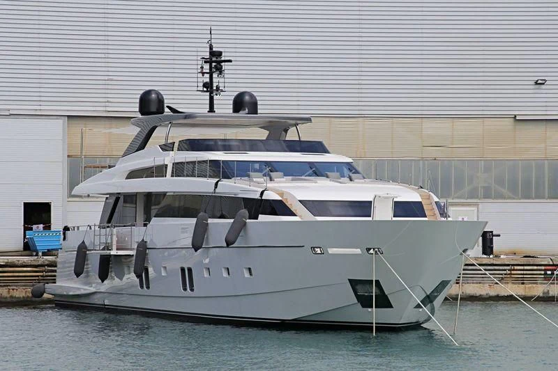 a white yacht in a large body of water aboard OCTAVE Yacht for Sale