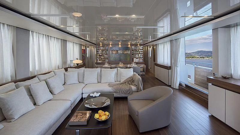 a living room with a large window aboard OCTAVE Yacht for Sale
