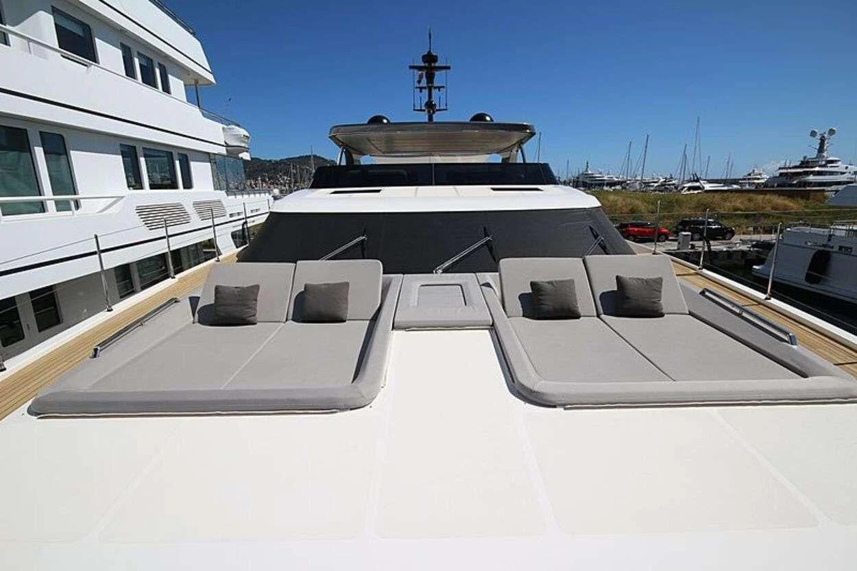 a large ship in a harbor aboard OCTAVE Yacht for Sale