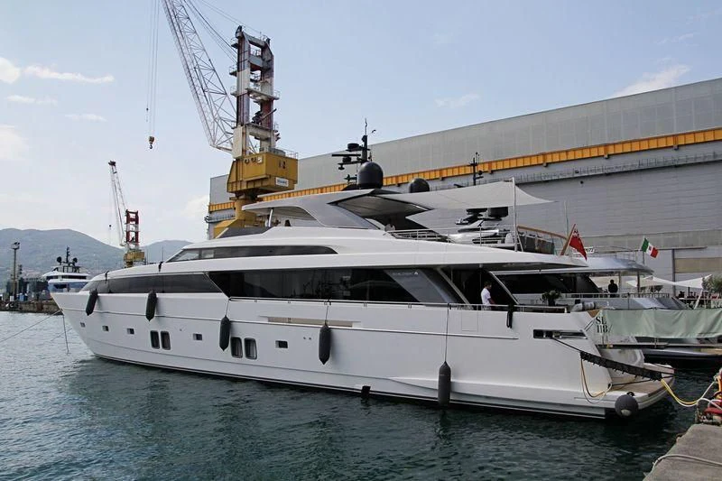 a large white boat in a harbor aboard OCTAVE Yacht for Sale
