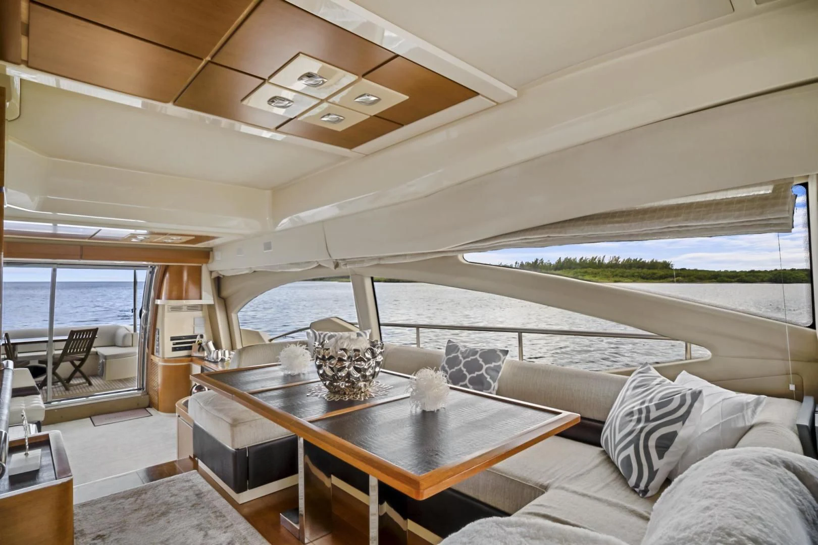 a living room with a large window aboard WICKED Yacht for Sale