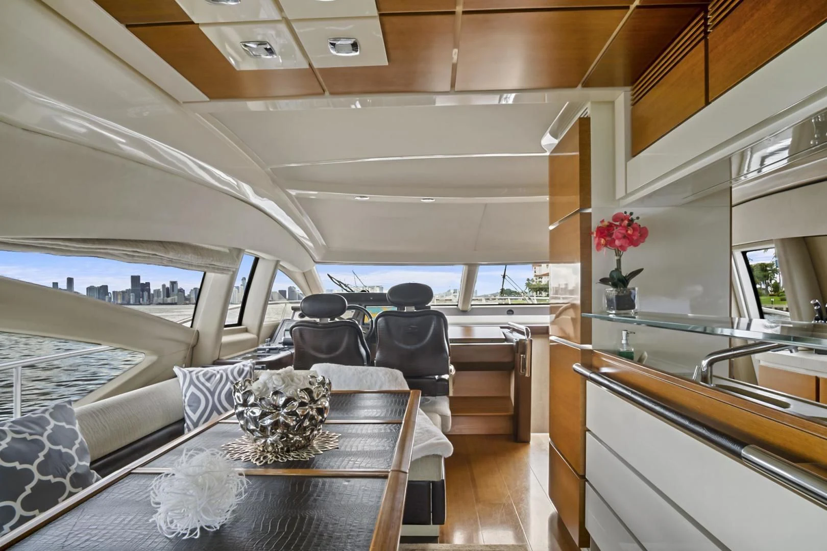 a dining room with a large table aboard WICKED Yacht for Sale