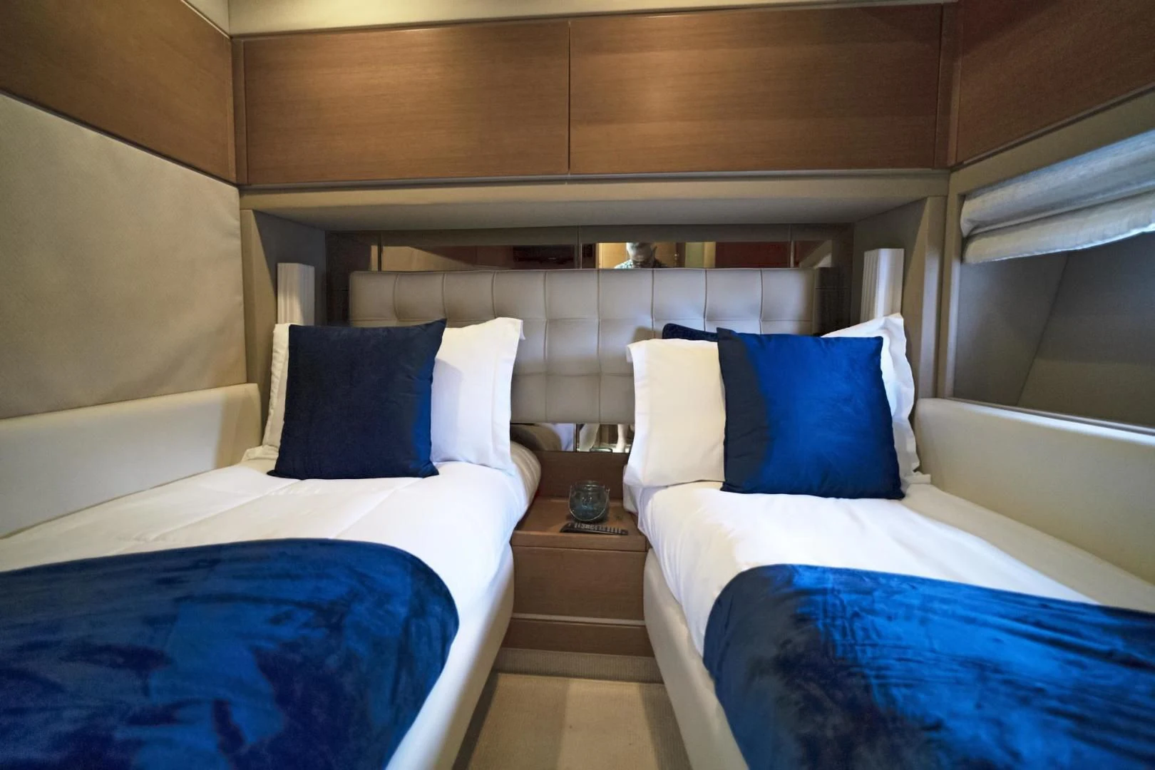 a room with two beds aboard WICKED Yacht for Sale