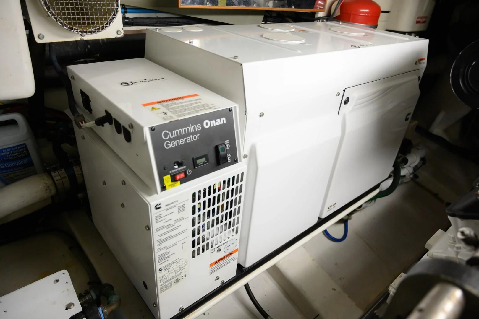 a white machine with black text aboard VK Yacht for Sale