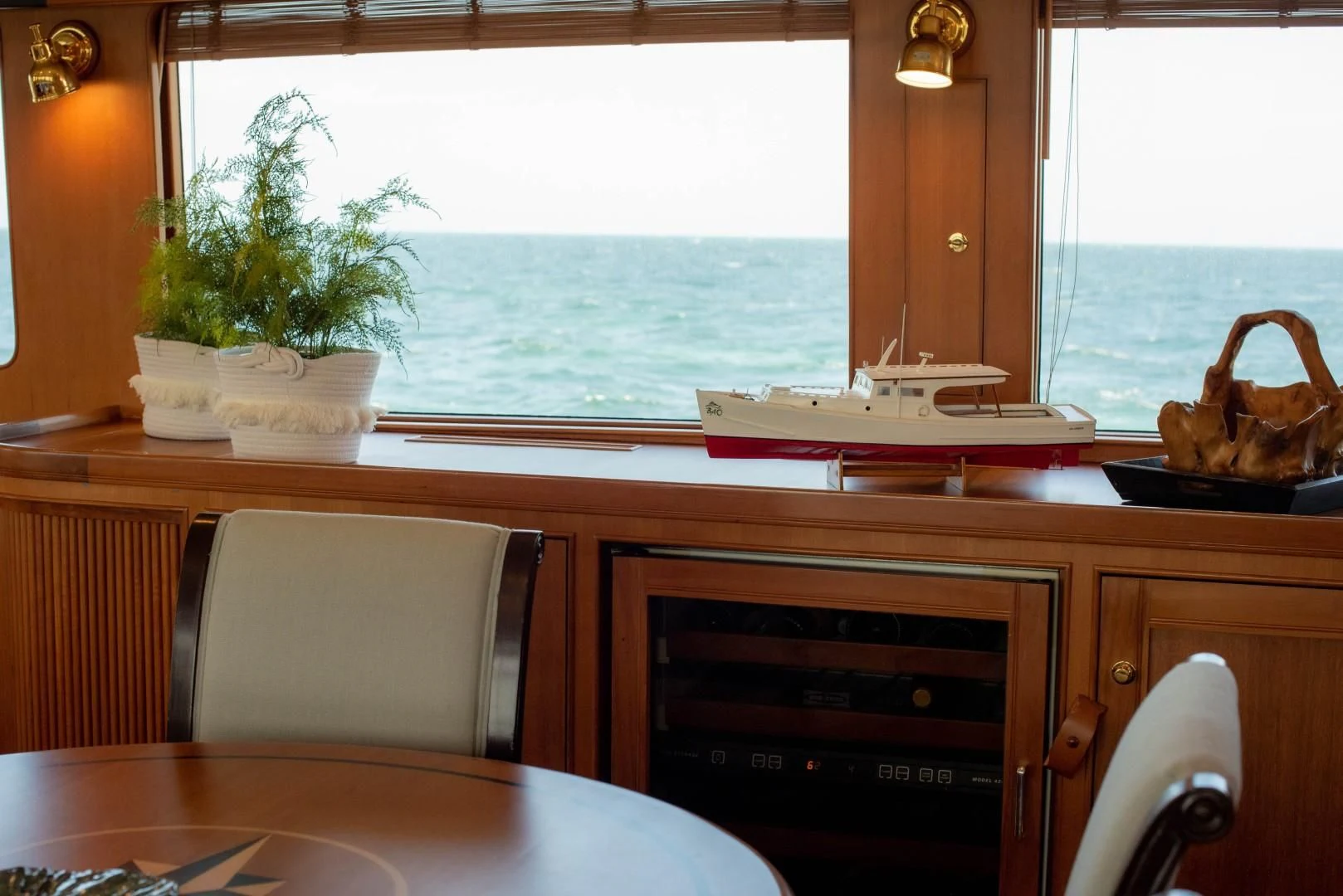 a kitchen with a large window aboard VK Yacht for Sale
