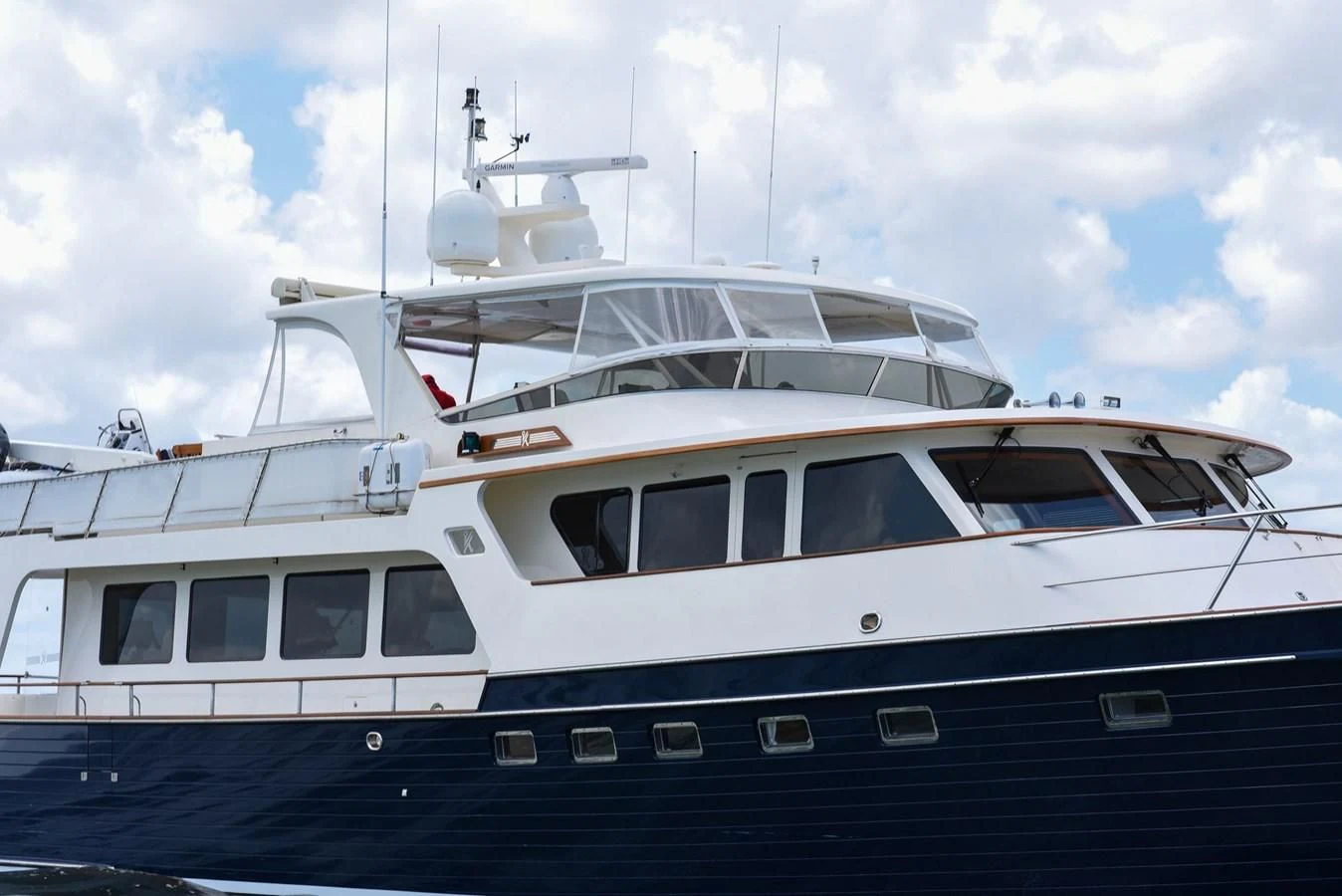 a yacht docked in the water aboard VK Yacht for Sale