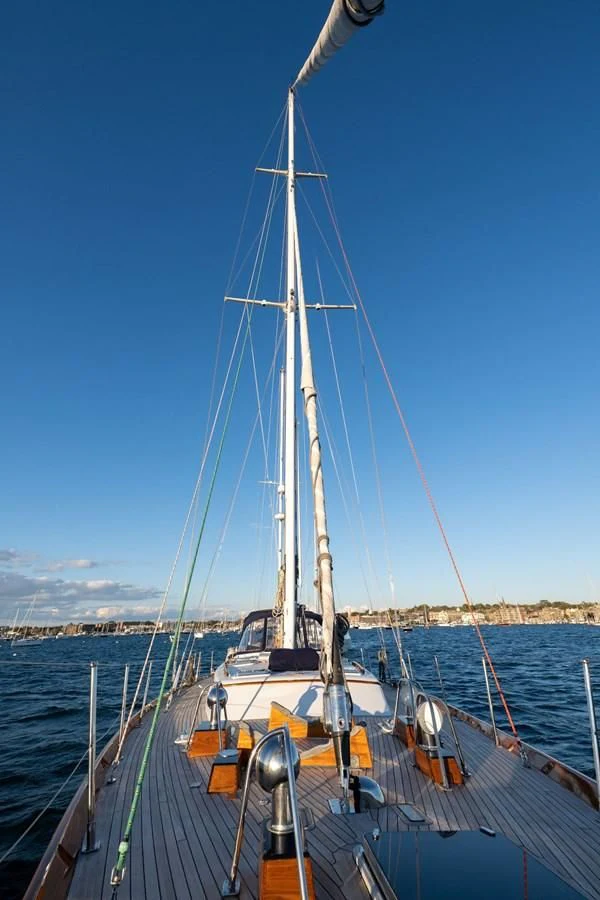 a sailboat on a dock aboard HERMIE LOUISE Yacht for Sale