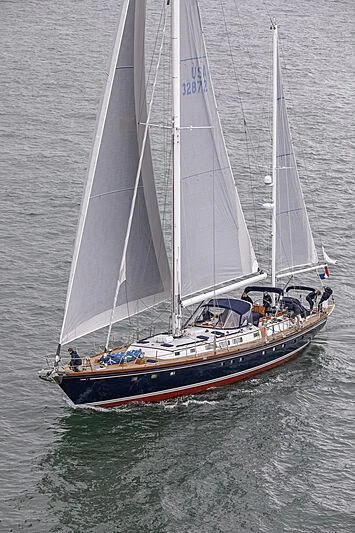 a sailboat on the water aboard HERMIE LOUISE Yacht for Sale