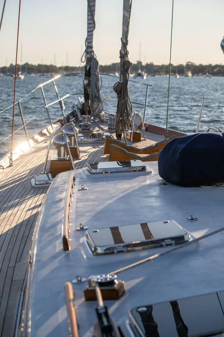a deck with a deck and a large ship on it aboard HERMIE LOUISE Yacht for Sale