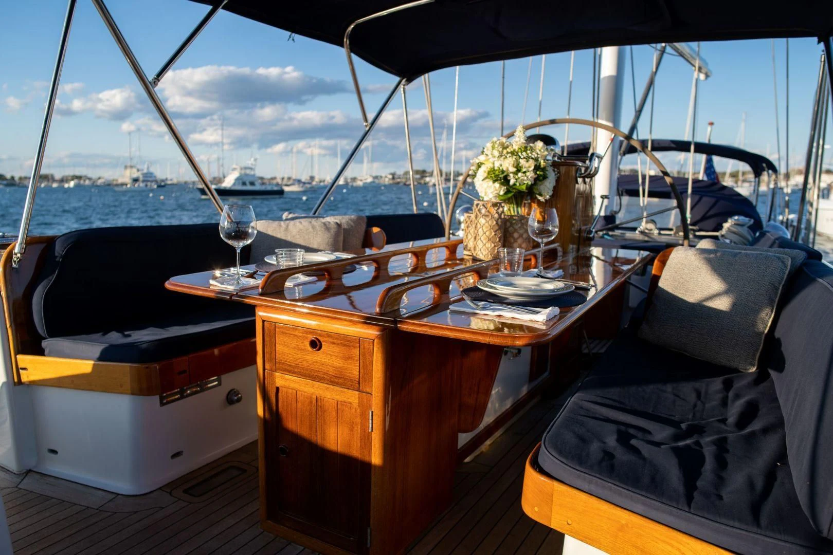 a wooden boat on the water aboard HERMIE LOUISE Yacht for Sale