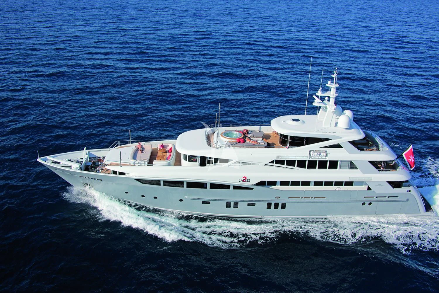 a white yacht on the water aboard 2 LADIES Yacht for Sale