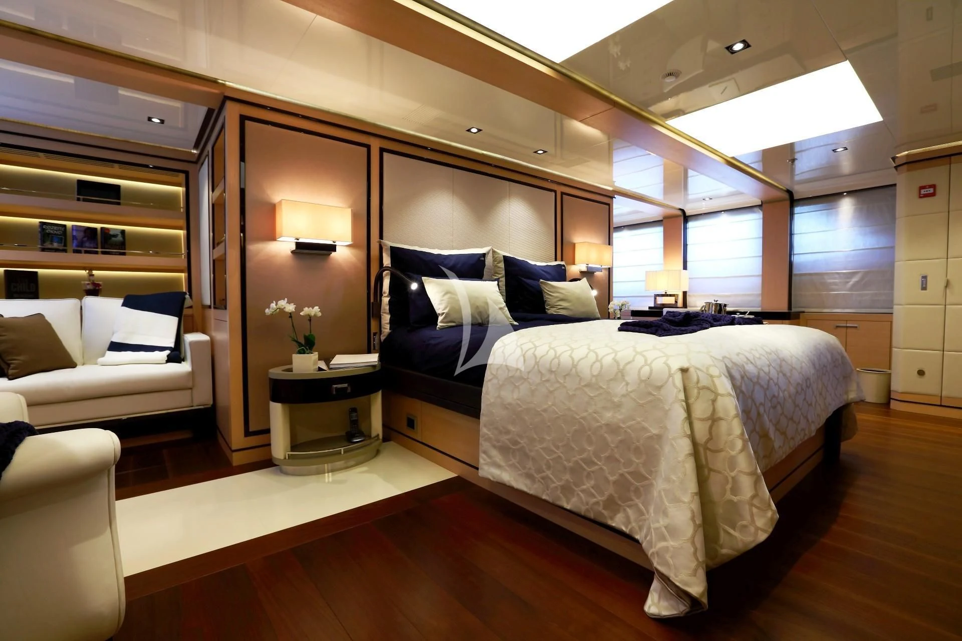 a bedroom with a large bed aboard 2 LADIES Yacht for Sale
