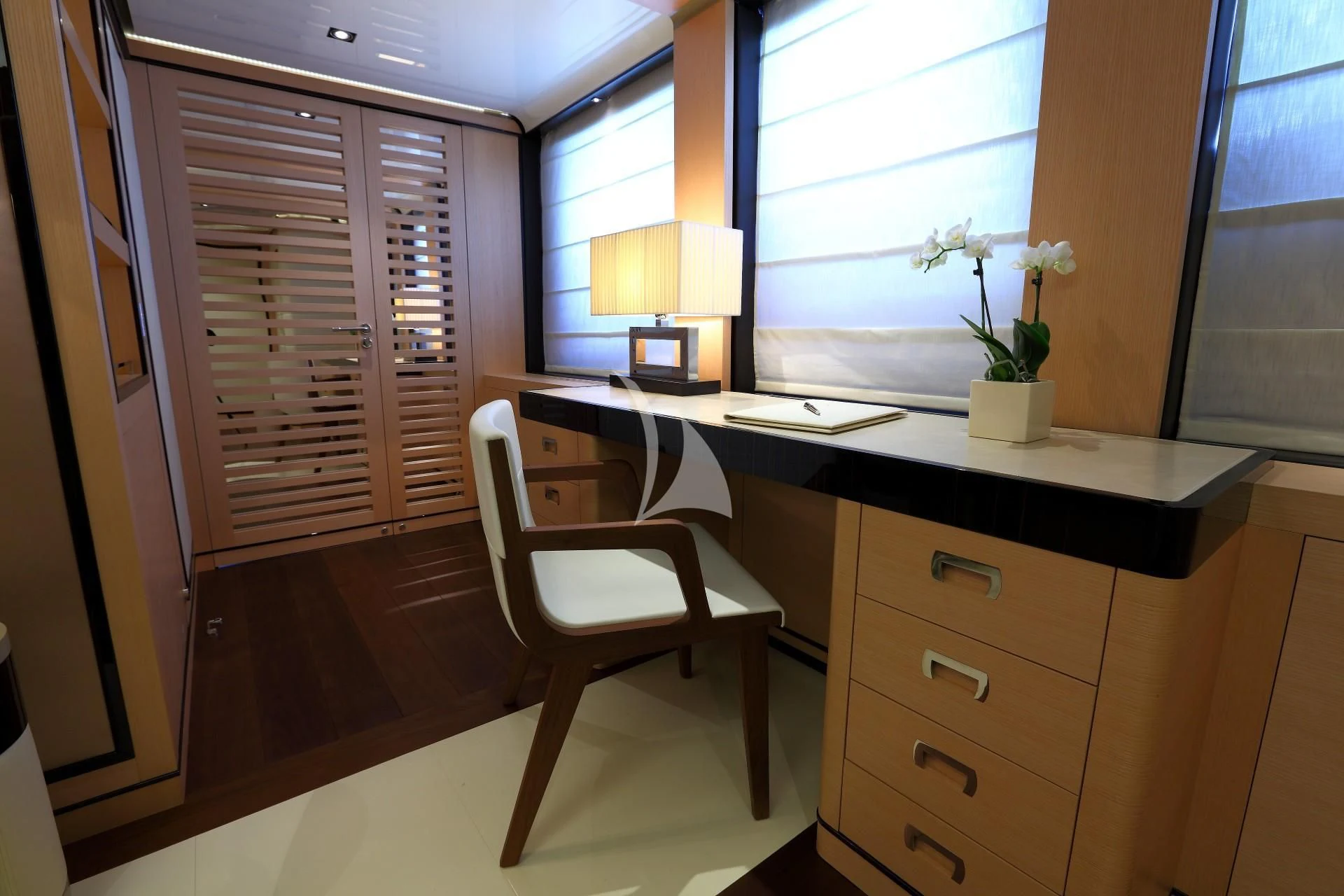 a chair in a room aboard 2 LADIES Yacht for Sale