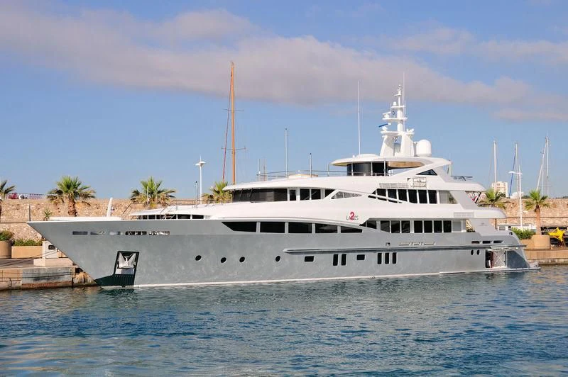 a large white boat aboard 2 LADIES Yacht for Sale