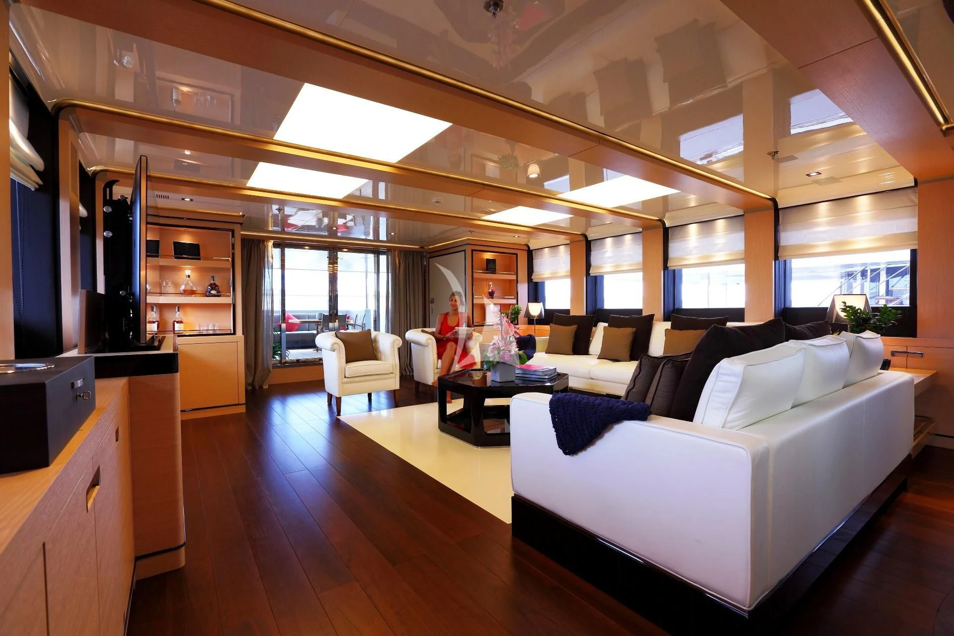 a room with a couch and a table aboard 2 LADIES Yacht for Sale