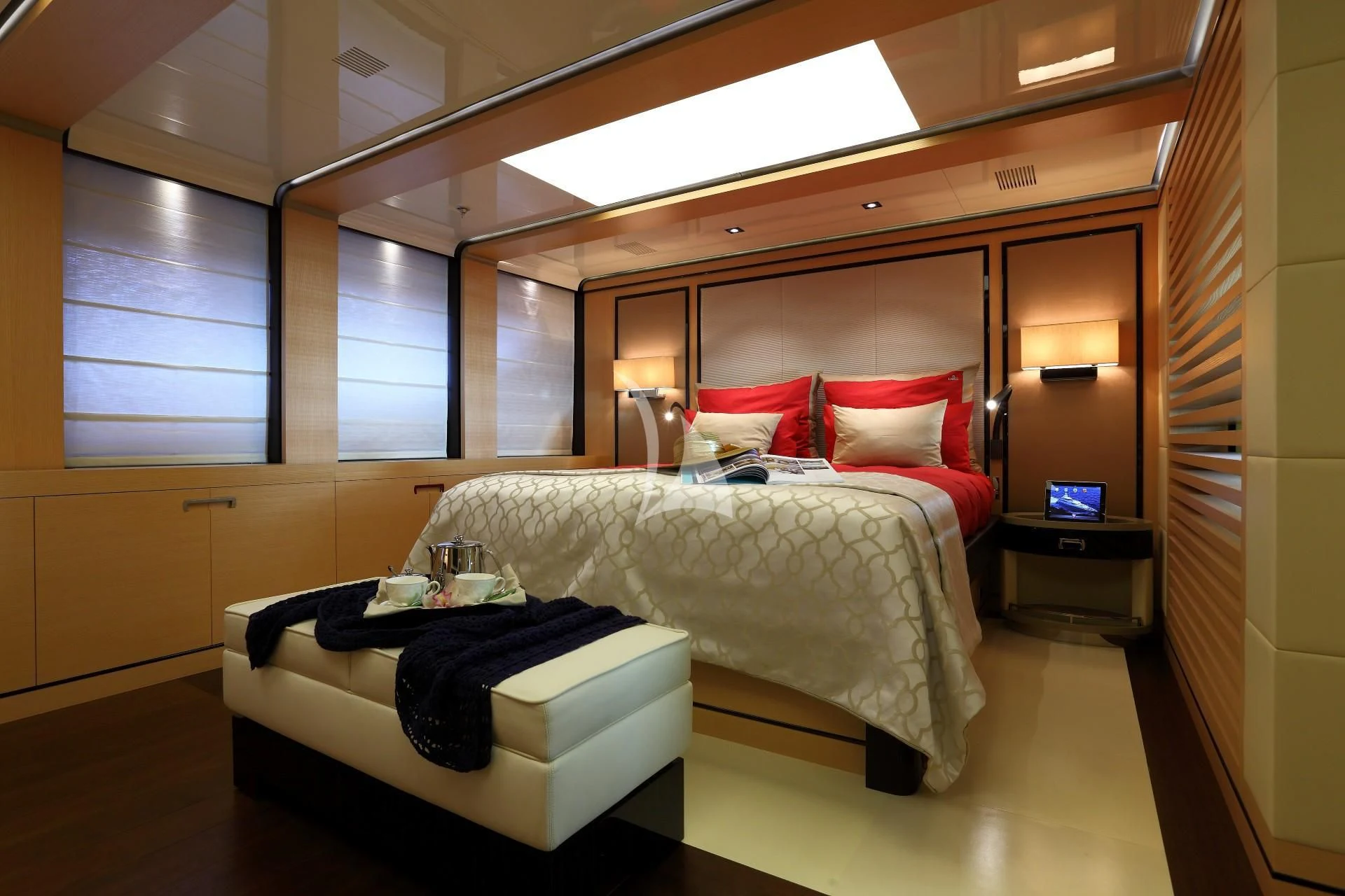 a room with a bed and a desk aboard 2 LADIES Yacht for Sale