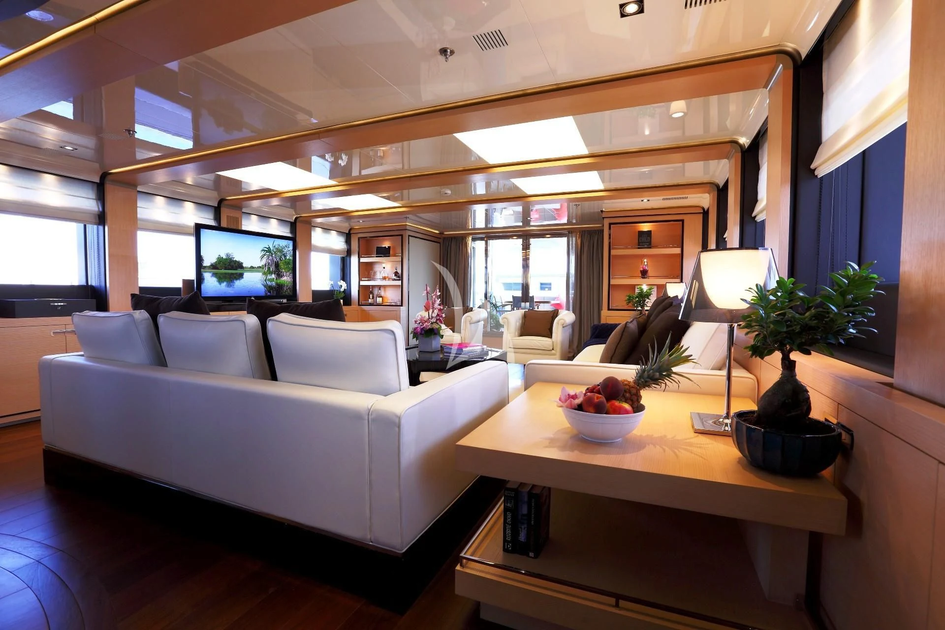 a living room with a large ceiling aboard 2 LADIES Yacht for Sale