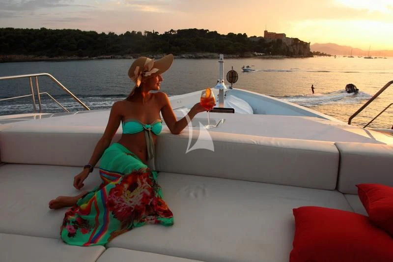 a person sitting on a boat aboard 2 LADIES Yacht for Sale