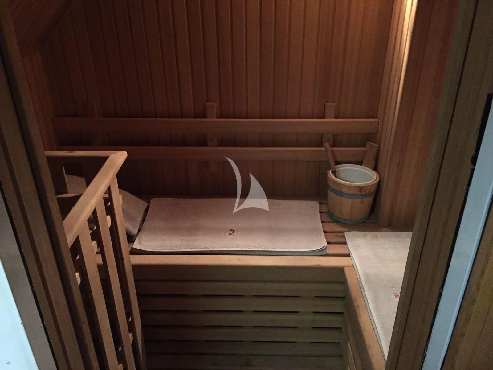 a wooden bench with a bucket on it aboard 2 LADIES Yacht for Sale