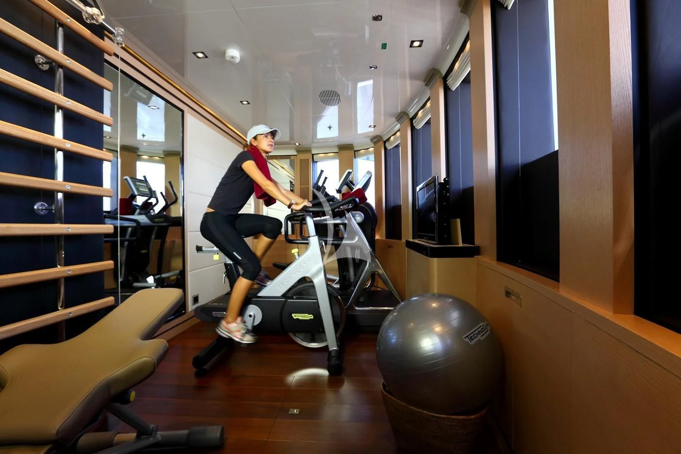 a person working out in a gym aboard 2 LADIES Yacht for Sale