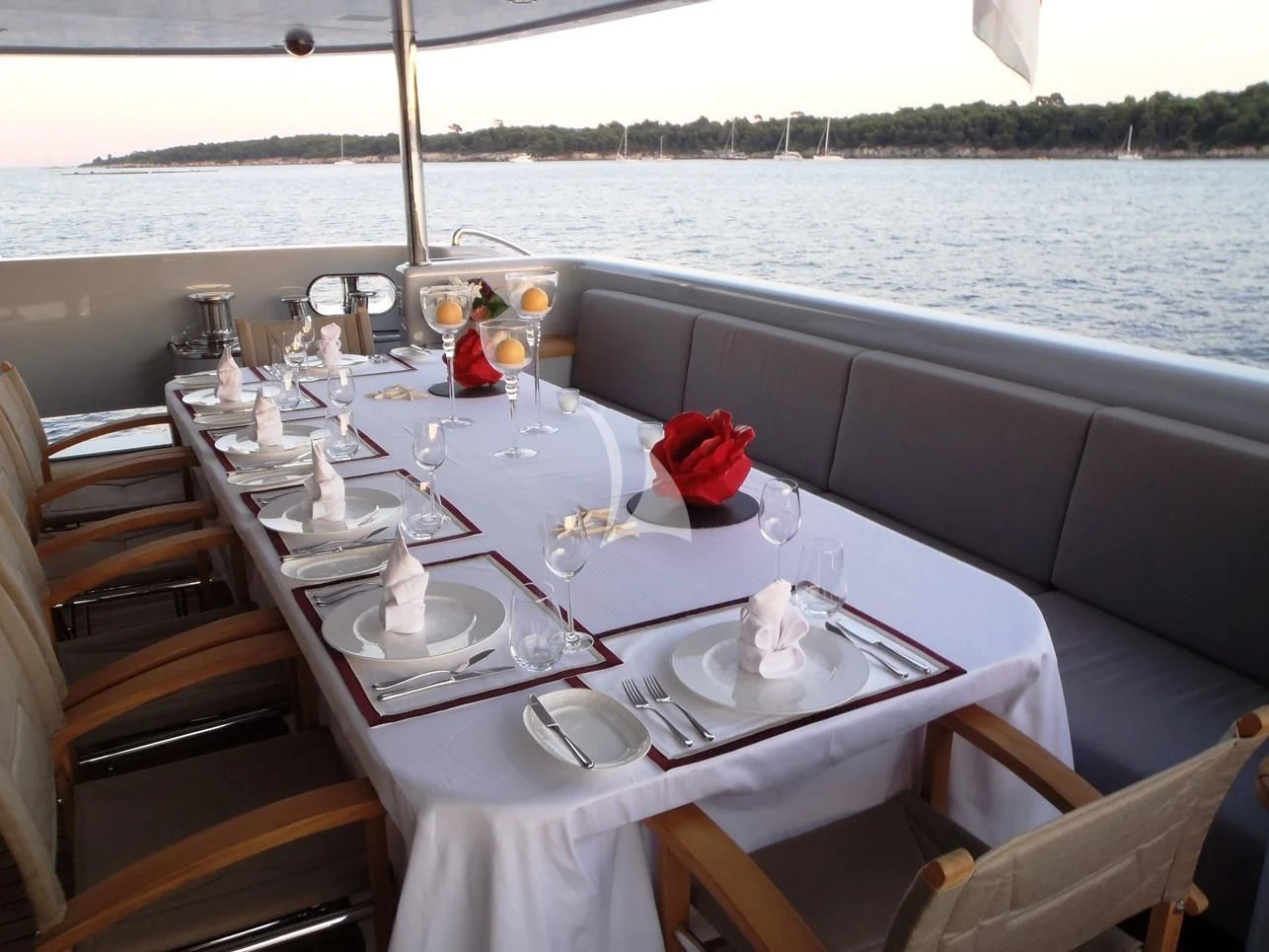 a table set for a dinner aboard 2 LADIES Yacht for Sale