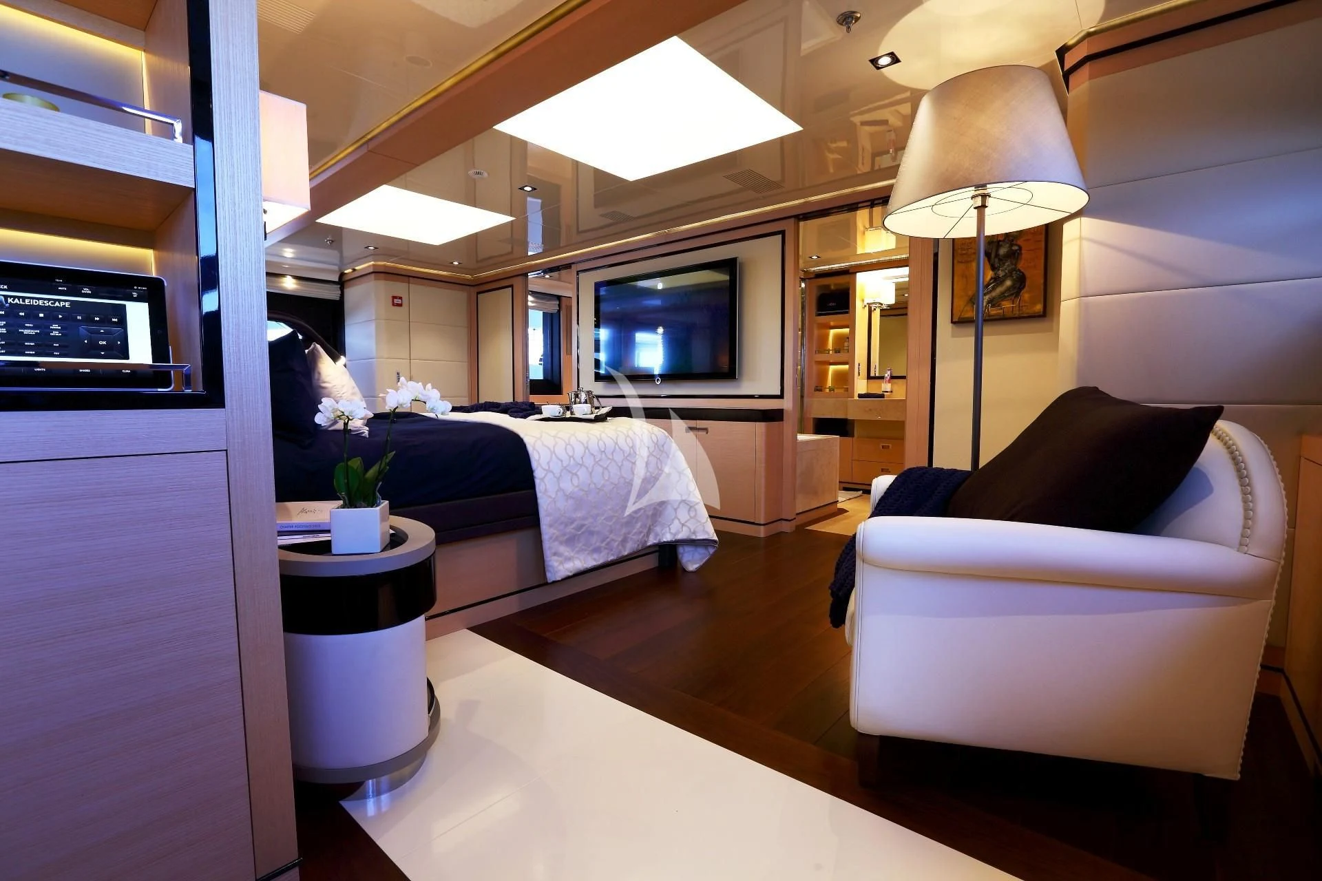a bedroom with a bed and a couch aboard 2 LADIES Yacht for Sale