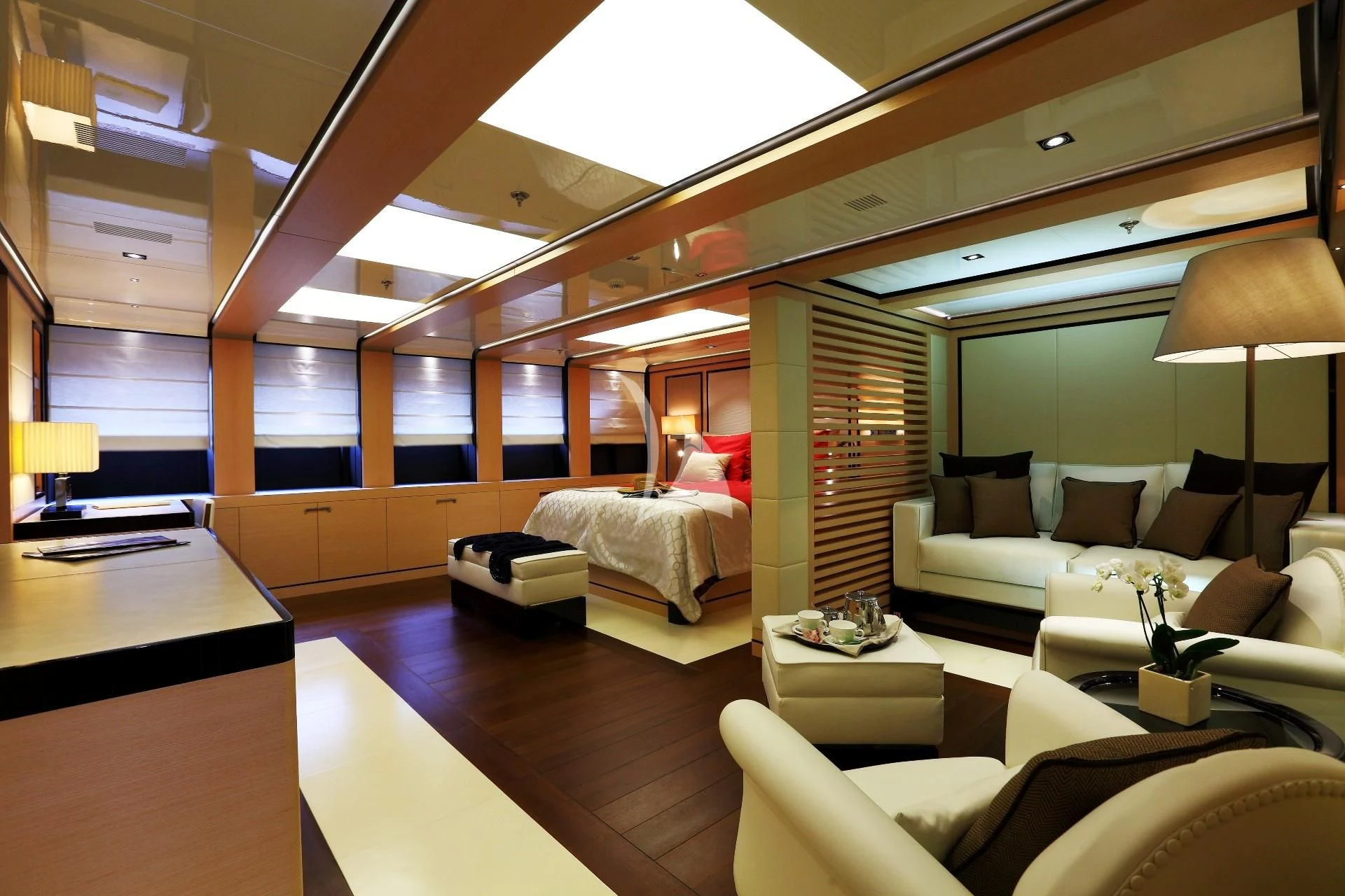 a room with a couch and a table aboard 2 LADIES Yacht for Sale